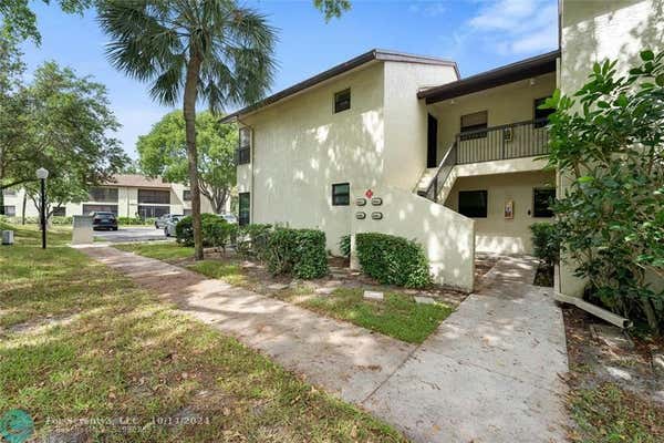 3305 COCOPLUM CIR # 3310, COCONUT CREEK, FL 33063 - Image 1