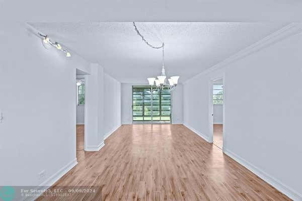 447 NE 195TH ST APT 316, MIAMI, FL 33179 - Image 1