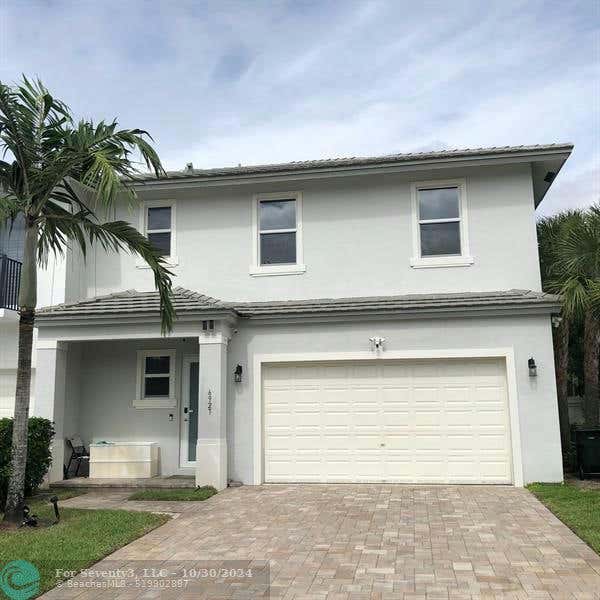 6927 PINES CIR, COCONUT CREEK, FL 33073, photo 1 of 24