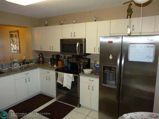 9537 WELDON CIR APT I201, FORT LAUDERDALE, FL 33321, photo 4 of 24