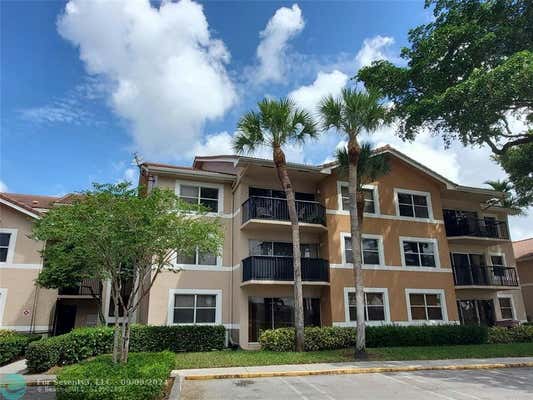 8977 WILES RD APT 305, CORAL SPRINGS, FL 33067 - Image 1