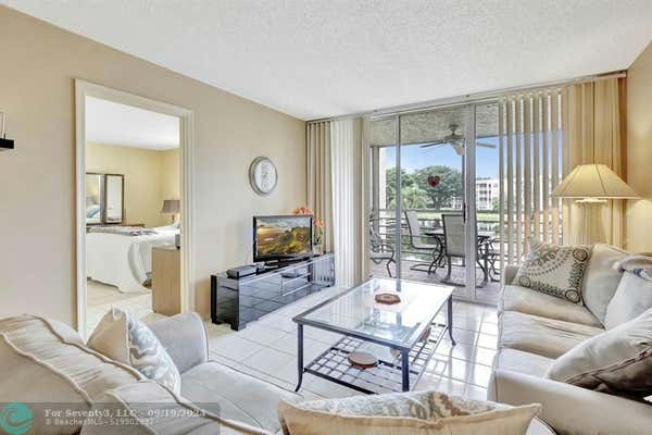 9311 ORANGE GROVE DR APT 210, DAVIE, FL 33324 - Image 1