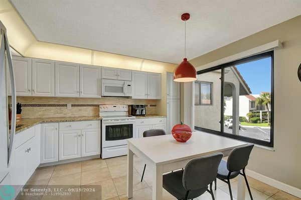 5603 FAIRWAY PARK DR APT 204, BOYNTON BEACH, FL 33437 - Image 1