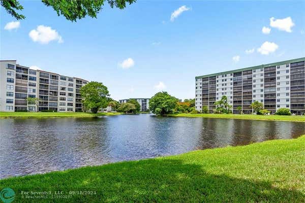 2221 CYPRESS ISLAND DR APT 204, POMPANO BEACH, FL 33069 - Image 1