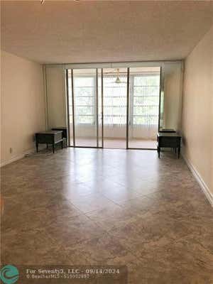 3001 NW 48TH AVE APT 336, LAUDERDALE LAKES, FL 33313 - Image 1