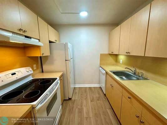 1551 SW 135TH TER APT G104, HOLLYWOOD, FL 33027, photo 3 of 21