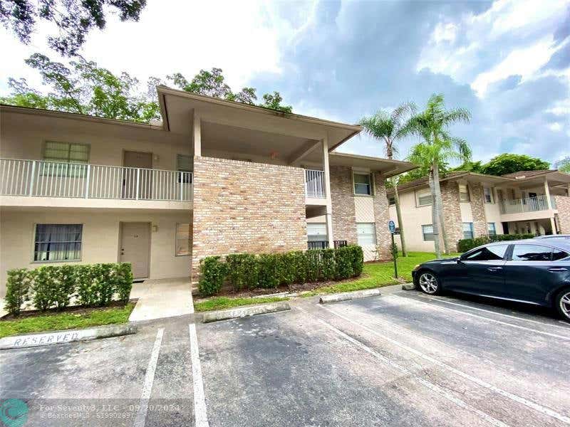 8317 ROYAL PALM BLVD # 104, CORAL SPRINGS, FL 33065, photo 1 of 2