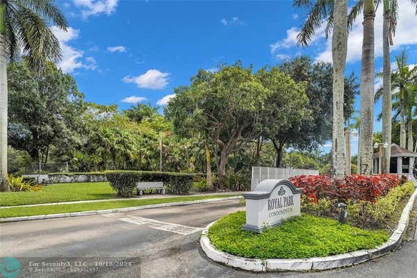 119 ROYAL PARK DR APT 1D, OAKLAND PARK, FL 33309 - Image 1