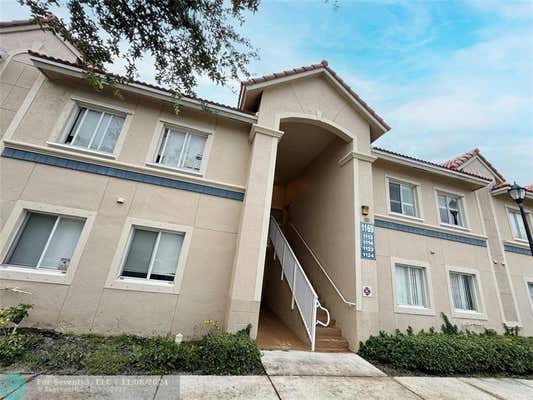 1169 GOLDEN LAKES BLVD APT 1123, WEST PALM BEACH, FL 33411 - Image 1