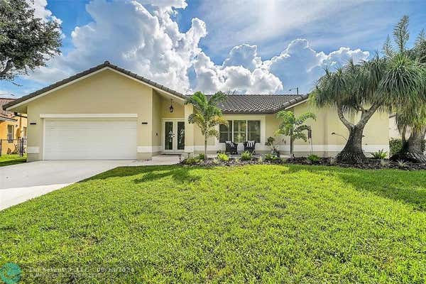 5180 NW 47TH AVE, COCONUT CREEK, FL 33073 - Image 1