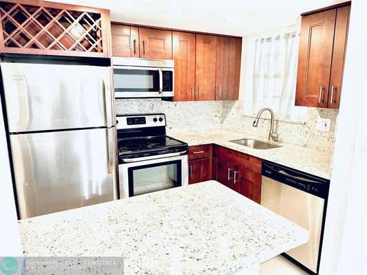 1040 SE 4TH AVE APT 129, DEERFIELD BEACH, FL 33441 - Image 1