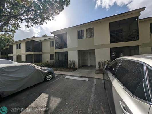 3030 NW 68TH ST APT 105, FORT LAUDERDALE, FL 33309 - Image 1