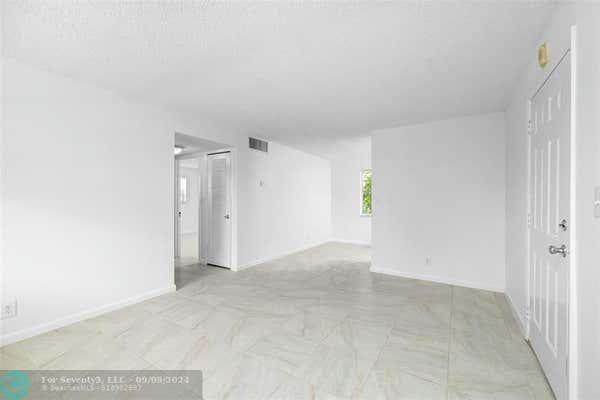 900 NE 26TH ST APT 9, WILTON MANORS, FL 33305, photo 4 of 22