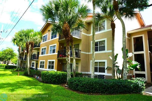 9033 WILES RD APT 305, CORAL SPRINGS, FL 33067 - Image 1