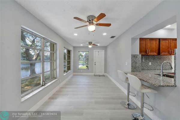 1105 NW 73RD TER, MARGATE, FL 33063, photo 4 of 43