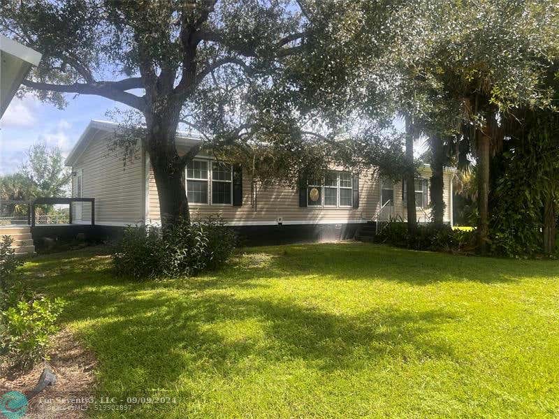 240 MOSE GRADE RD, OKEECHOBEE, FL 34974, photo 1 of 64