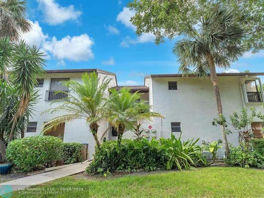 3119 COCOPLUM CIR # 33105, COCONUT CREEK, FL 33063 - Image 1