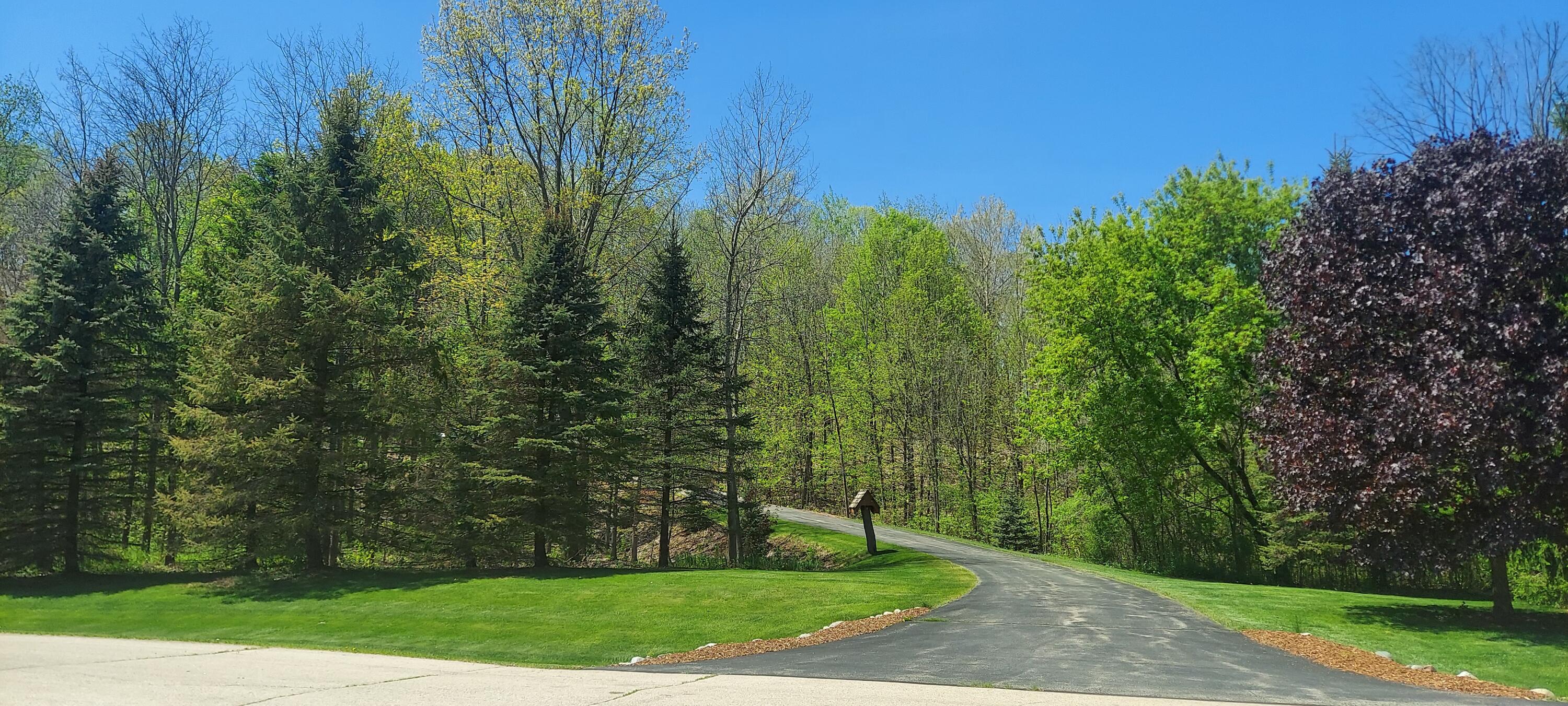Slinger, Wisconsin, 53086, United States, 5 Bedrooms Bedrooms, ,4 BathroomsBathrooms,Residential,Active,2011435