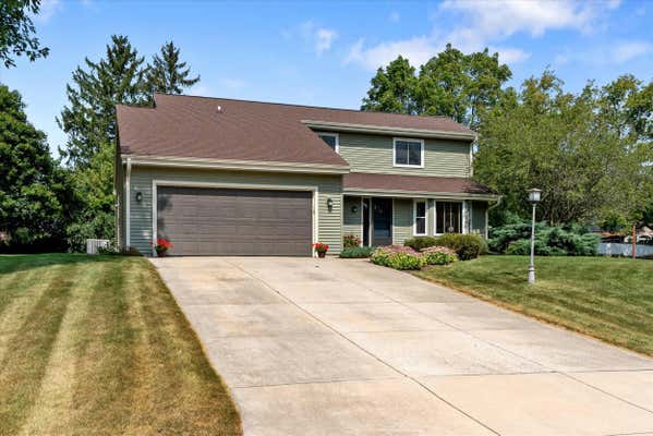 11850 W WOODLAND CIR, HALES CORNERS, WI 53130 - Image 1