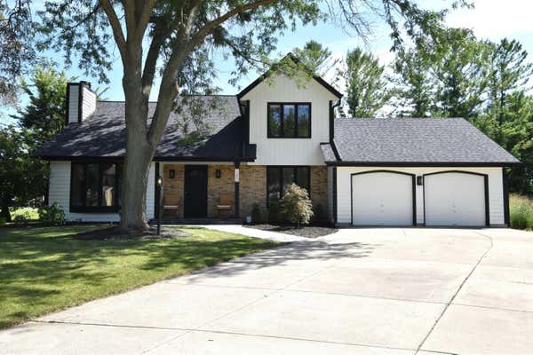 11801 W WOODLAND CIR, HALES CORNERS, WI 53130 - Image 1