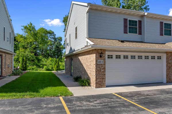 322 KETTLE MORAINE DR N APT 1, SLINGER, WI 53086 - Image 1