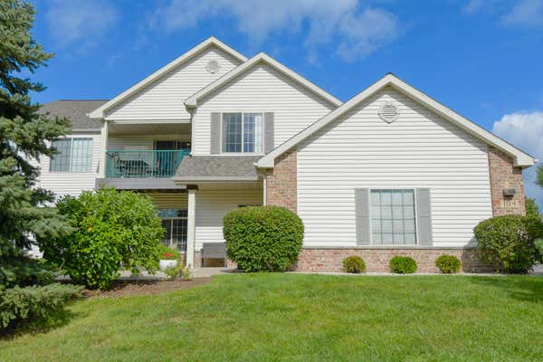 104 PHEASANT RUN UNIT A, JOHNSON CREEK, WI 53038 - Image 1