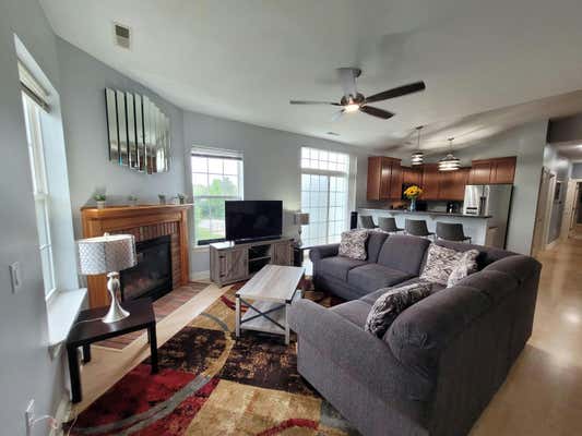 2060 RAINBOW LAKE LN APT 221, WEST BEND, WI 53090 - Image 1