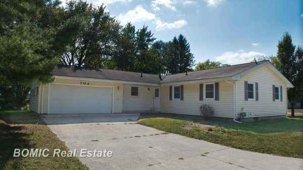 704 N WATER ST, VASSAR, MI 48768 - Image 1