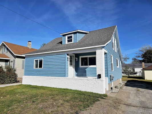 122 N 1ST ST, MANISTIQUE, MI 49854 - Image 1