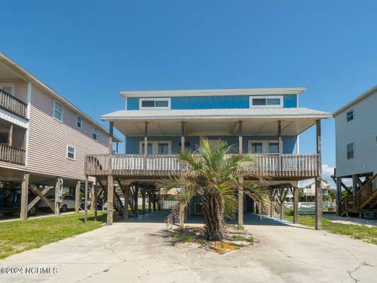 718 W BEACH DR, OAK ISLAND, NC 28465, photo 2 of 42