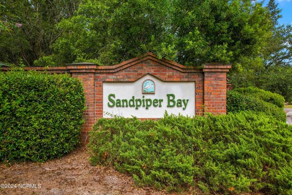 547 SANDPIPER BAY DR SW, SUNSET BEACH, NC 28468, photo 2 of 50