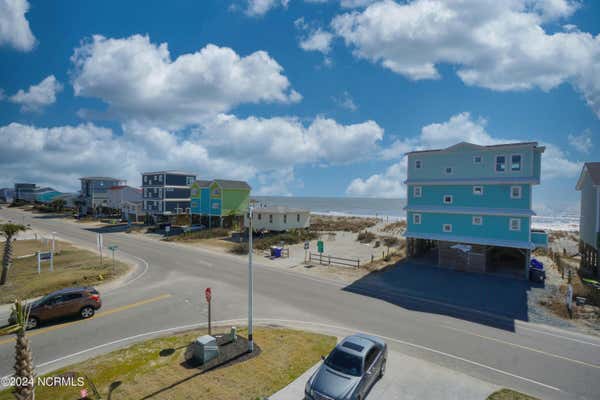 102 W BEACH DR, OAK ISLAND, NC 28465, photo 2 of 50