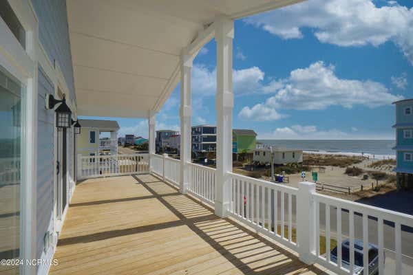 102 W BEACH DR, OAK ISLAND, NC 28465, photo 3 of 50