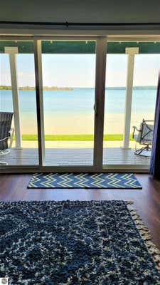 8569 PORTAGE POINT DR # T15, ONEKAMA, MI 49675 - Image 1