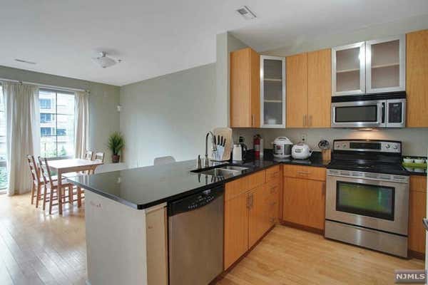 24 AVE AT PORT IMPERIAL APT 116, WEST NEW YORK, NJ 07093 - Image 1