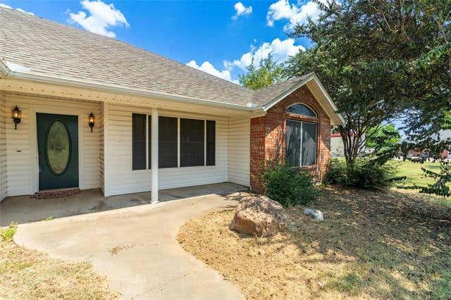 1021 ASHLEY LN, COMMERCE, TX 75428, photo 1 of 39