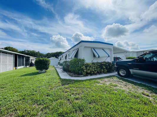 7457 SE SWAN AVE, HOBE SOUND, FL 33455 - Image 1