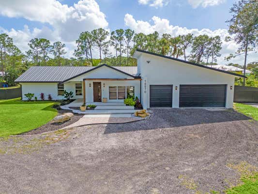 16570 ORANGE BLVD, LOXAHATCHEE, FL 33470 - Image 1