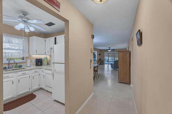 25 LAKE VISTA TRL APT 102, PORT SAINT LUCIE, FL 34952 - Image 1