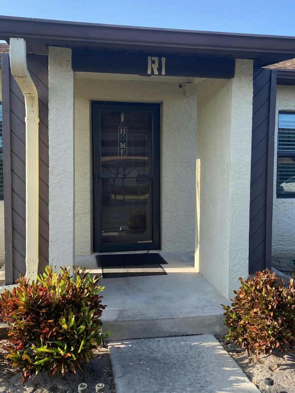 6036 INDRIO RD APT 1, FORT PIERCE, FL 34951, photo 1 of 11