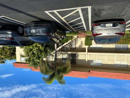 2 ABBEY LN APT 107, DELRAY BEACH, FL 33446 - Image 1