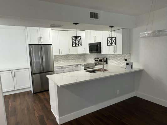 7690 TAHITI LN APT 102, LAKE WORTH, FL 33467 - Image 1