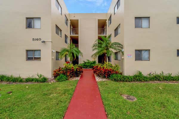 5160 LAS VERDES CIR APT 310, DELRAY BEACH, FL 33484 - Image 1