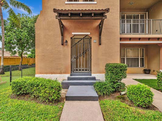 3557 FOREST HILL BLVD APT 50, PALM SPRINGS, FL 33406 - Image 1