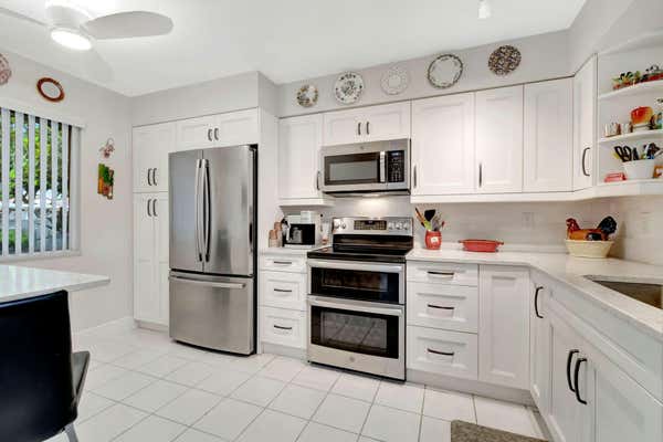 14096 HUNTINGTON POINTE DR APT 110, DELRAY BEACH, FL 33484 - Image 1