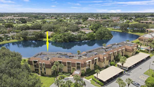 5188 WOODLAND LAKES DR APT 137, PALM BEACH GARDENS, FL 33418 - Image 1