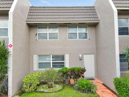 9050 NW 28TH ST APT 120, CORAL SPRINGS, FL 33065 - Image 1