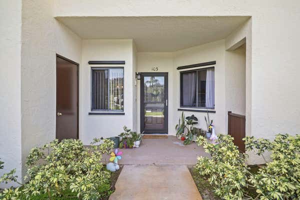 6303 SE WILLIAMSBURG DR APT 103, HOBE SOUND, FL 33455, photo 3 of 36