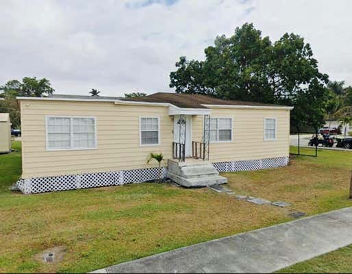 297 E 4TH ST, PAHOKEE, FL 33476 - Image 1