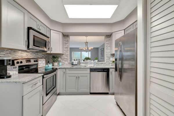 14376 AMBERLY LN APT 407, DELRAY BEACH, FL 33446 - Image 1